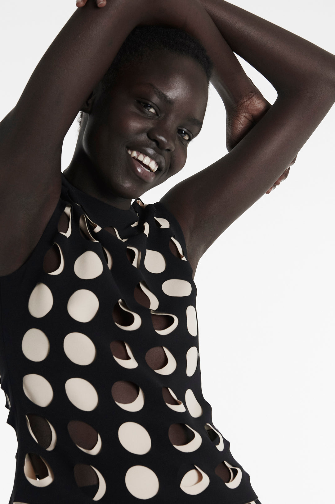 Top With Layered Circular Cutouts Black Nude